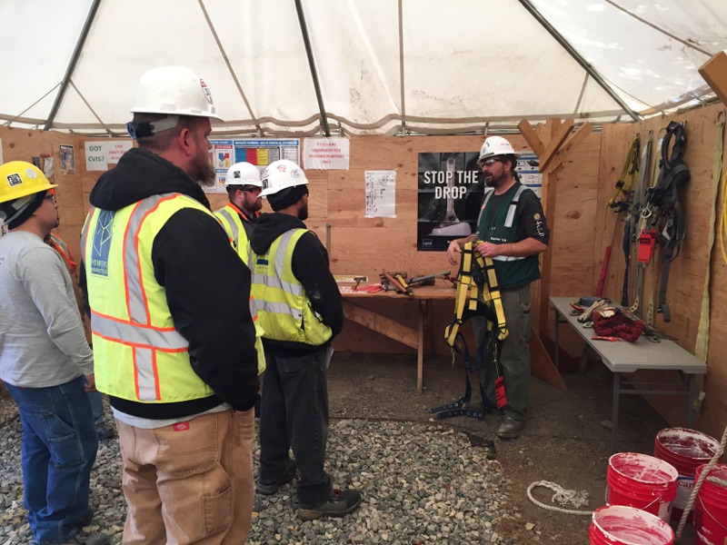 CVIS Liaison Dave Mefford reviews fall protection with new hires in the CVIS Education Center at the Replacement Medical Center Facility in Colorado. 