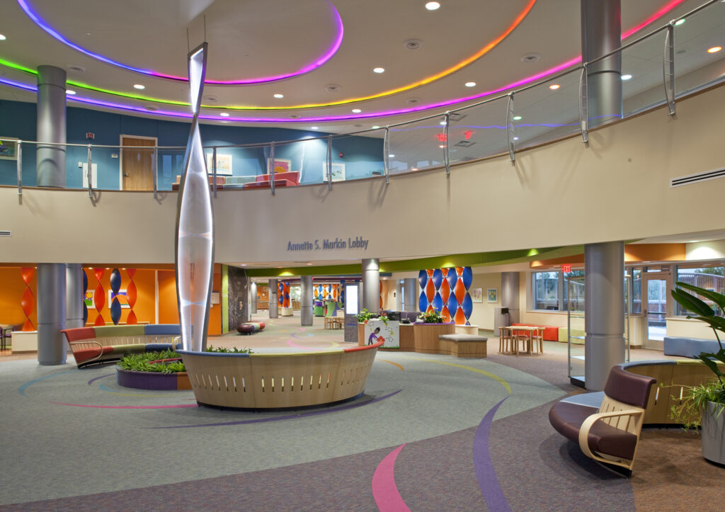 Vibrant colors and an open floor plan to provide a welcoming atmosphere for patients and families at the Children’s Hospital Specialty Pediatric Center.