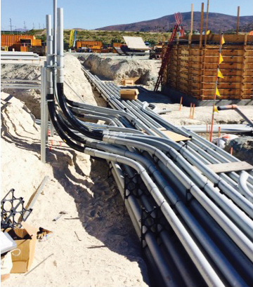 A network of electrical ductbank is seen in the main trench on the site.