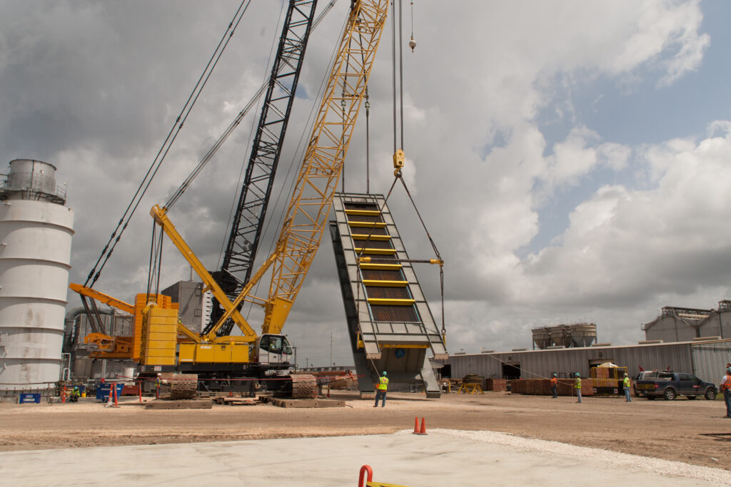To transport large equipment to the construction site, TIC modified nearby roads, bridges and overhead utility lines.
