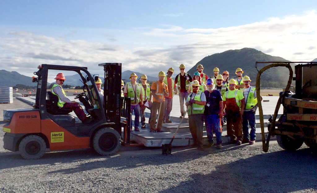 Workers install the last EMAS block at Kodiak Airport.