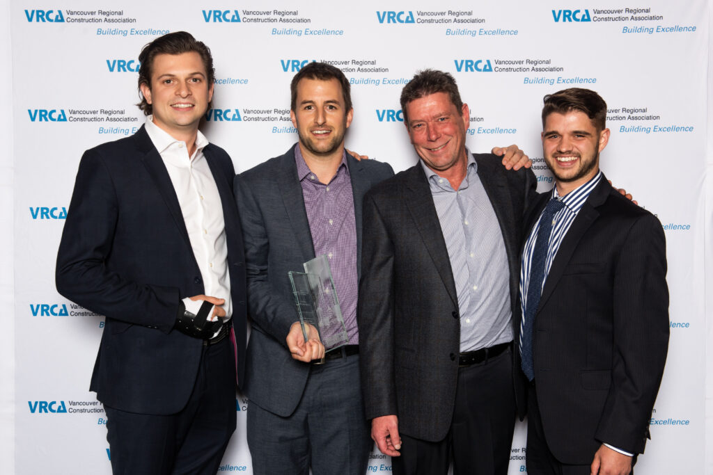 Members of Kiewit's project team accept the VRCA Gold Award of Excellence for efforts on the Powell Spillgate Rehabilitation project.