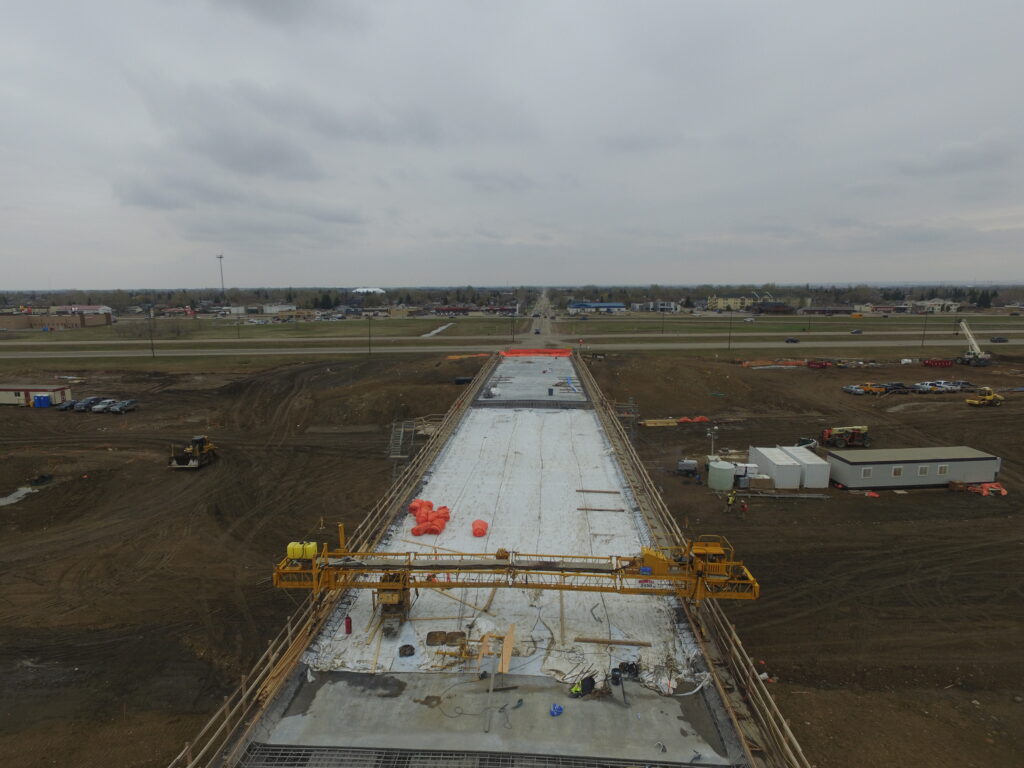 Photo looking east toward the city of Martensville shows the final deck pour on the Martensville Bridge.