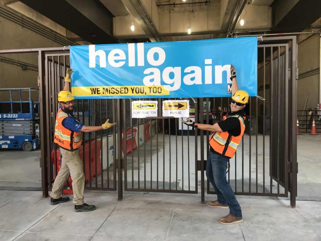 Tyler Turpin, Huntington Station manager, left, and Kyle Peterson, Huntington Station project engineer, get the station ready for the public.