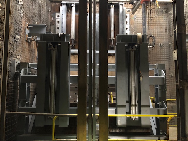 Two chutes are used to help meter and load excavated rock that will be hoisted to the surface.