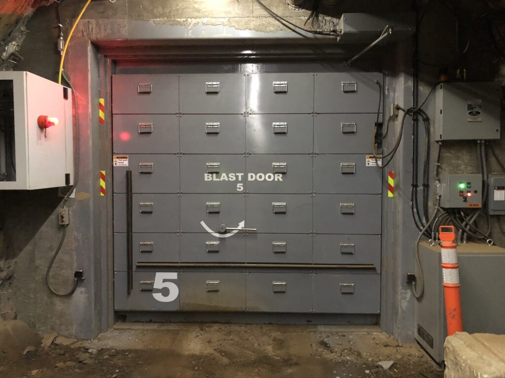 Six blast doors were installed to keep air pressure, air flow and blast effects away from an existing laboratory on the 4850 level.