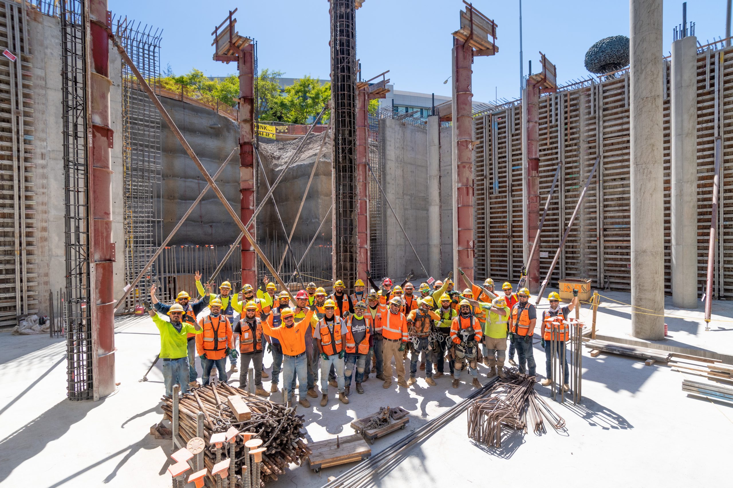 The SWIP team stands in the 1.5 million gallon stormwater capture tank for a photo.