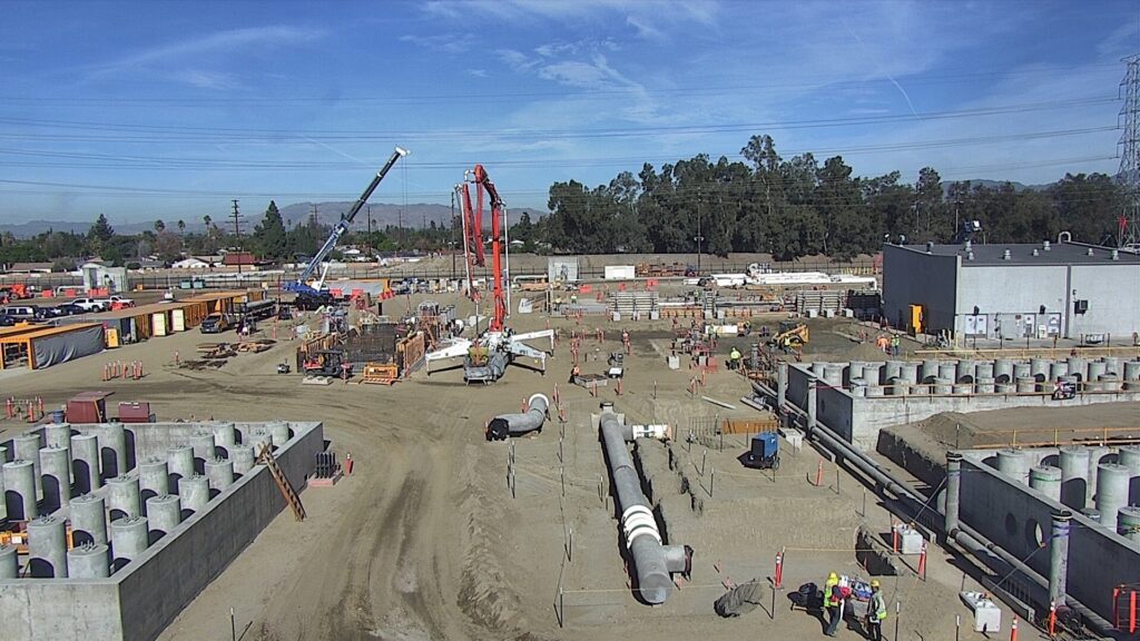 Crews install underground piping and electrical systems in addition to the granular activated carbon (GAC) vessel support columns (shown in the foreground) on the Tujunga site. The North Hollywood and Tujunga plants will extract water from two sets of existing, non-producing groundwater wells, treating 50 million gallons a day and 25 million gallons a day, respectively. 