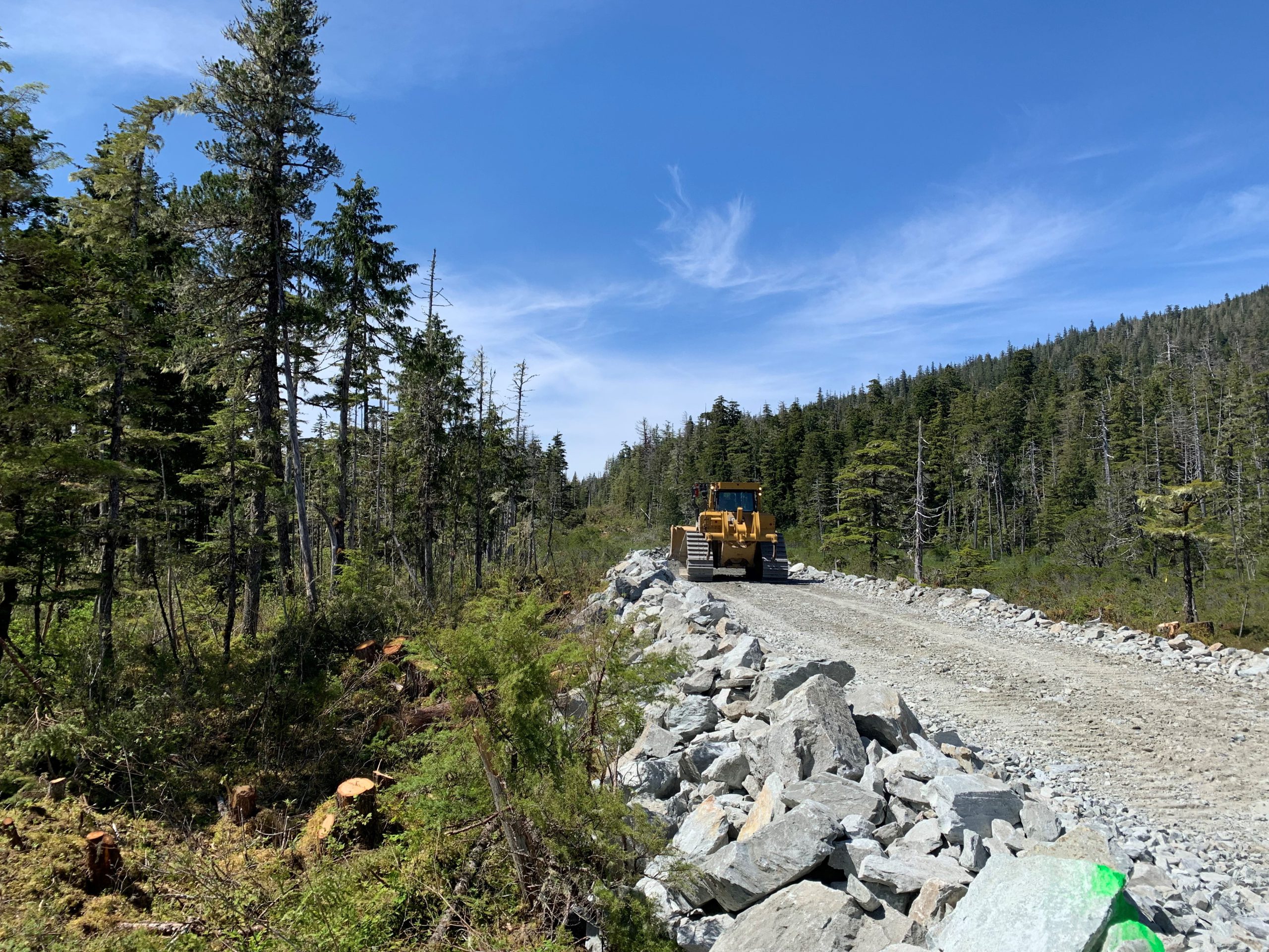 Although serving a small population, a Kiewit team makes a big impact by constructing a year-round access road through a remote Alaskan island. 