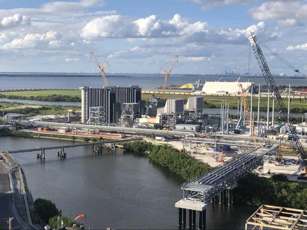 Cranes were used to place sections of the 2,500-linear-feet of pipe rack in place over a canal.