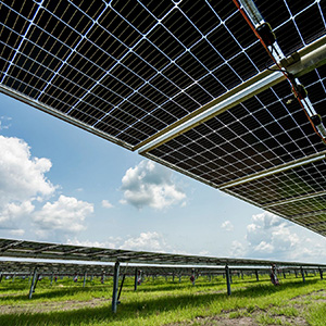 Image of solar panels with blue sky in the background
