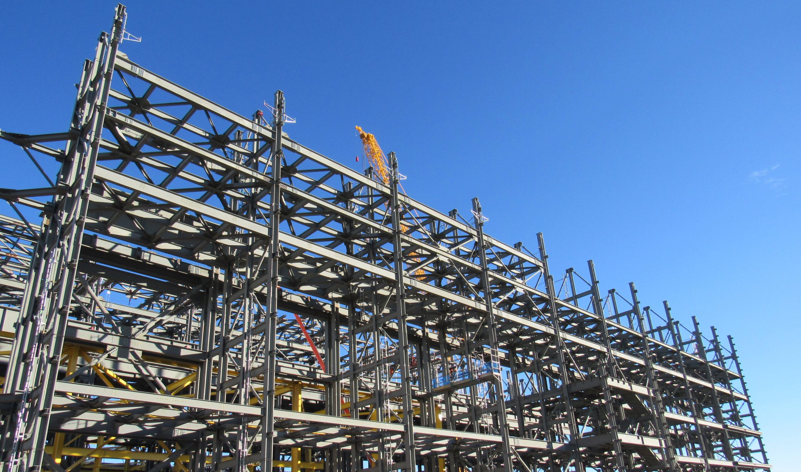 The south half of the west wall takes shape at the Spent Fuel Handling Facility. Once complete, the facility will include 17,000 tons of nuclear quality structural steel. 