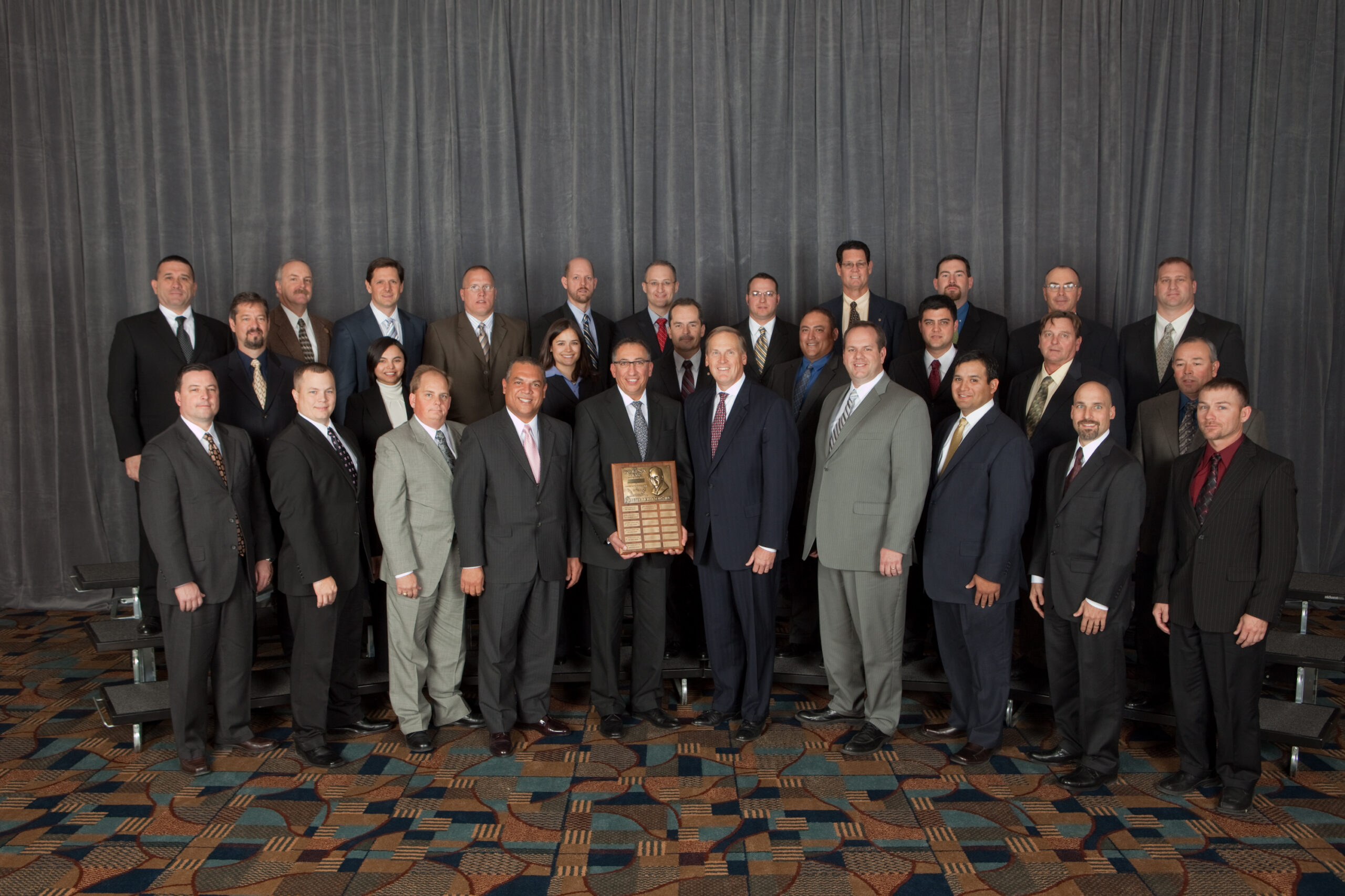 The KOS team accepts the Bob Wilson Award, Kiewit’s highest internal recognition for safety over a three-year period, for the second year in a row. 