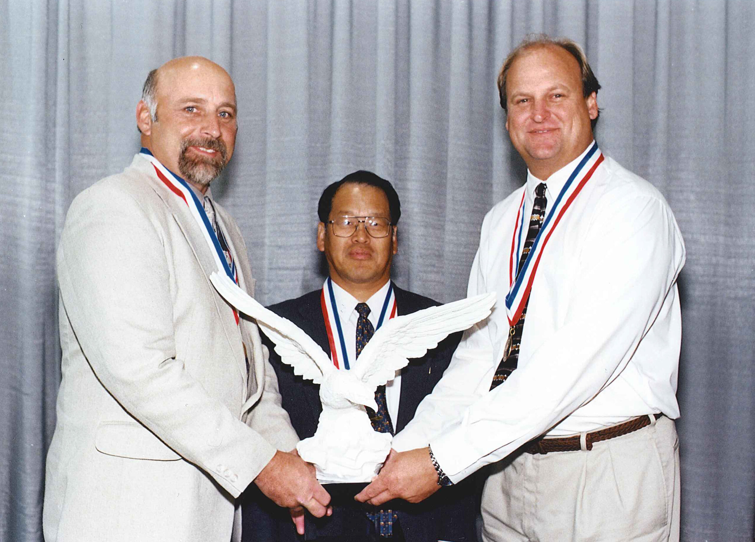 Butch Miller (left) and his team accepted the national Associated Builders and Contractors Eagle Award in 2000, recognizing project excellence and safety performance.