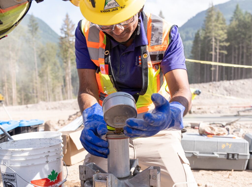 Field Engineer Karan Jain receivestraining on concrete quality control testing. Two years later, Jain serves as project engineer, one of many team members who grew into expanded roles over the life of the project.