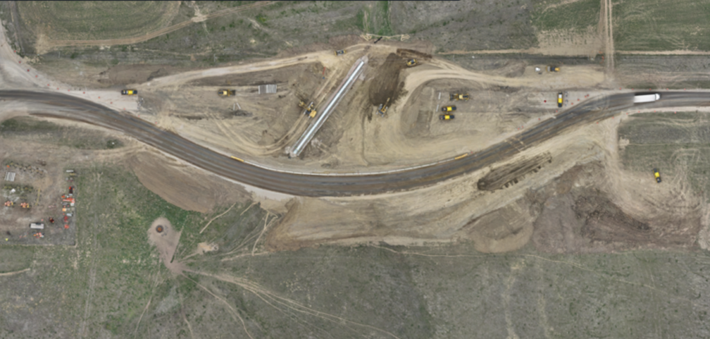 April – Remove existing roadway and timber bridge; install 60" drainage 